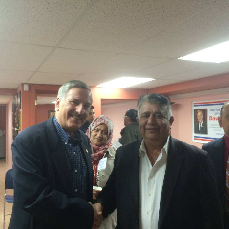 Abid Butt with Assembley member David I Weprin.